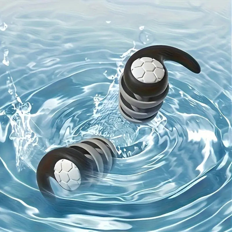 Öronproppar placerade i vatten för att visa vattentålig design