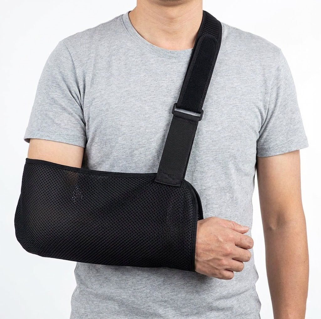 Armslinga med justerbar axelrem – avlastar arm och axel