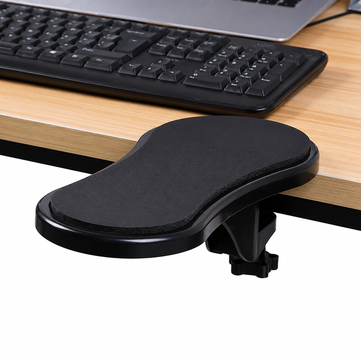 Ergonomiskt armstöd för skrivbord med avlastning för handled och underarm.