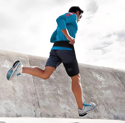 Höftstöd i neopren med kompression, använt vid löpning utomhus.