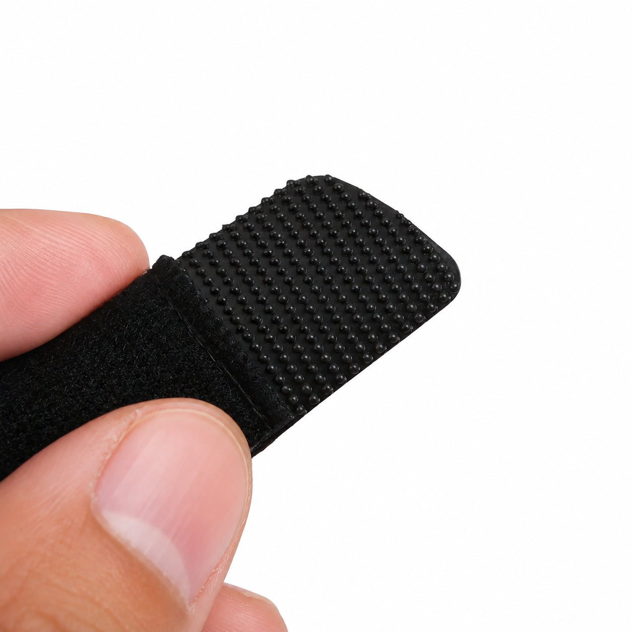 Justerbar fingerskena med halkfri rem för säker passform.