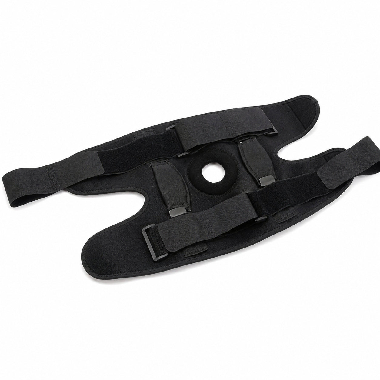 Justerbart knäskydd med öppen patella, sidostöd och justerbara spännband.
