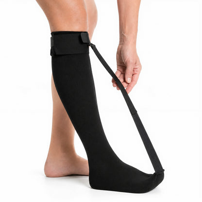 Person använder nattsocka mot hälsporre på fot och vad
