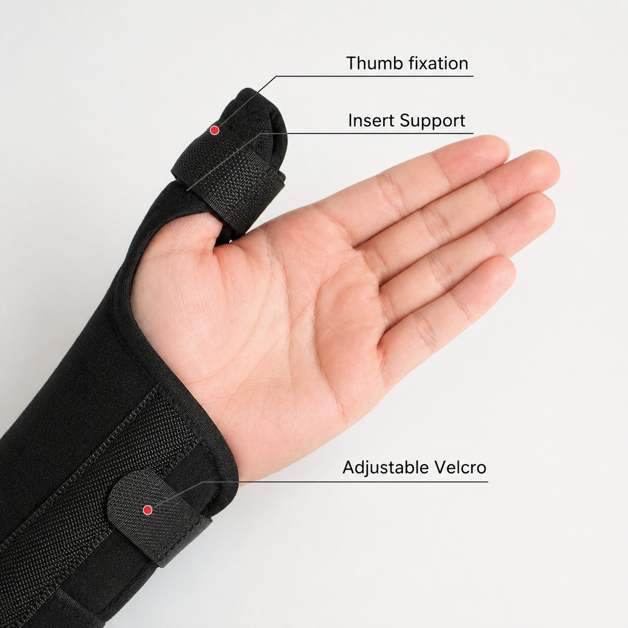 Handledsstöd med tumstöd som visar justerbar tumfixering, stabiliserande skena och kardborreband.